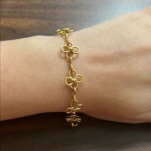 Gold plated stainless steel multi flower bracelet